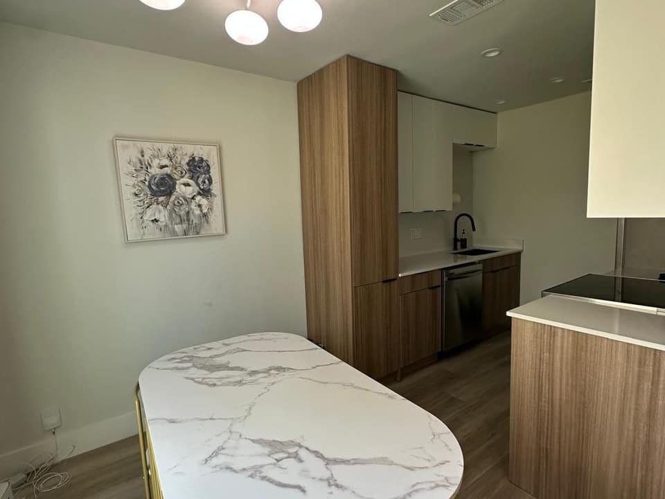 Clean, empty modern kitchen with clear counters, ready to move into