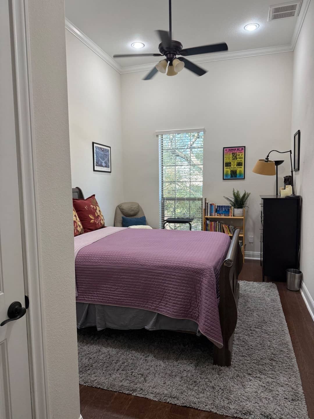 Tidy bedroom with the bed made and floors clean, left ready to hand back
